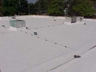 Second coating applied by Roof Menders