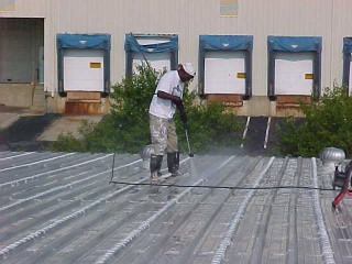 Prepping the roof surface is important for proper application of cool white roof