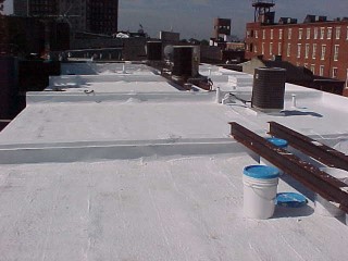 View of finishe project with acrylic roof coating