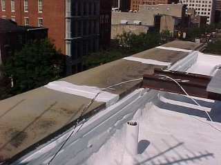 Parapet is flashed to prevent leaks